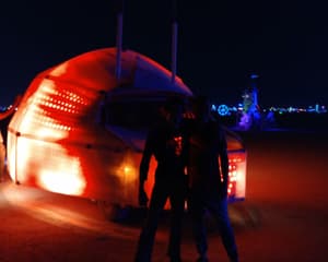 Martin Borch Jensen and Francisco LePort beside their art car at Burning Man in 2018